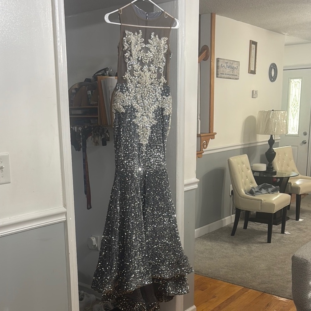 Elegant Sequin Gown with Floral Embellishments prom dress